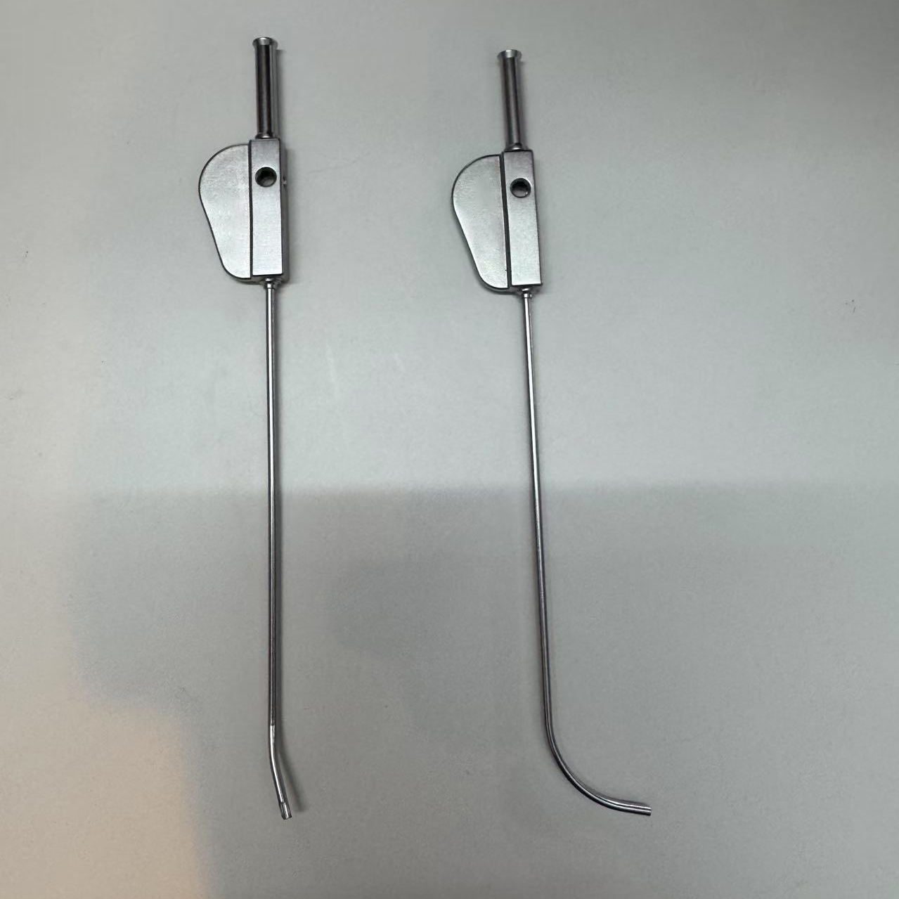 Meniscal repair cannula and needle guide